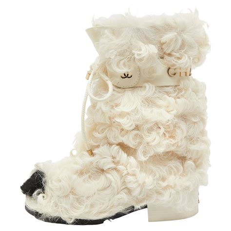 chanel white fur boots|Chanel leather boot with heel.